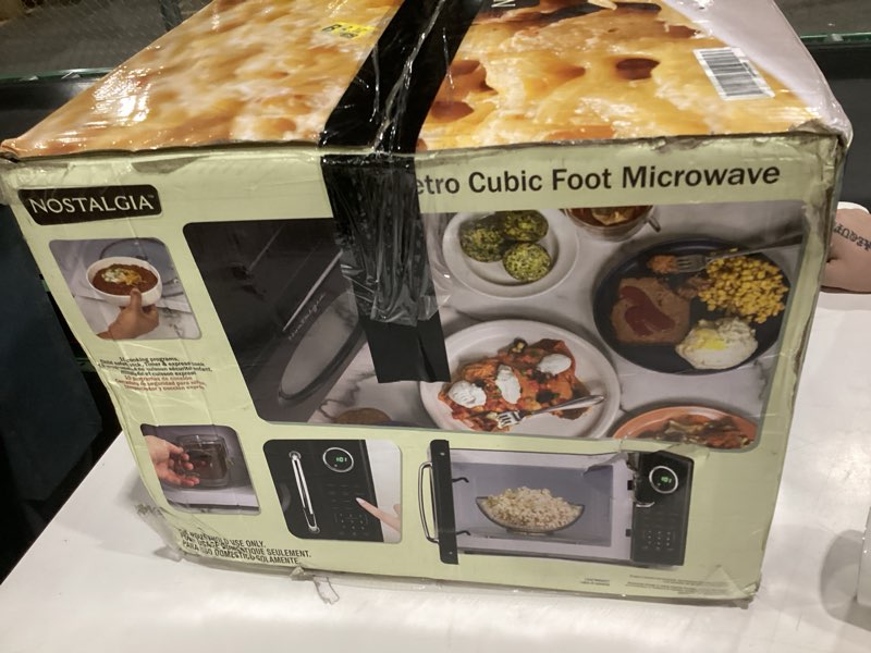 Condition photo showing Good Condition for Nostalgia Retro 1000W Microwave Oven 1.1 Cu Ft Capacity – Child Safety Lock, 8 Auto-Cook Settings – 