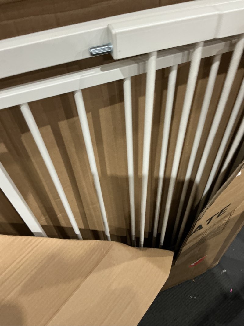 Condition photo showing As Is for cumbor 30-40.6 in baby gate for stairs and doorways, dog gate indoor white | mom's choice awards winner, auto close, double lock, safety child gate for toddlers & pets, pressure or hardware