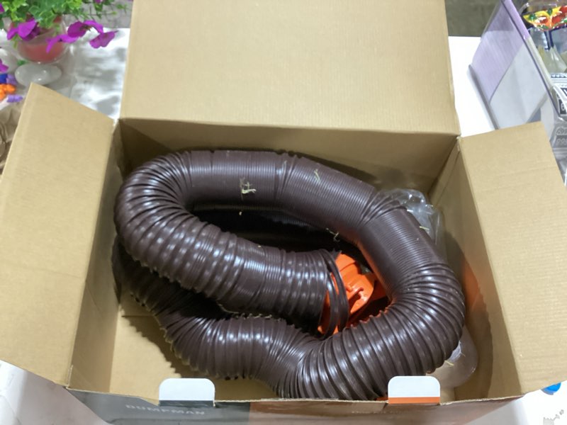 Condition photo showing As Is for dumpman 20 ft rv sewer hose kit, sewer hose for rv camper - includes 2 attachable 10 ft sewer hose with swivel fitting, 90 degree clear view sewer adapter, and 4 storage caps