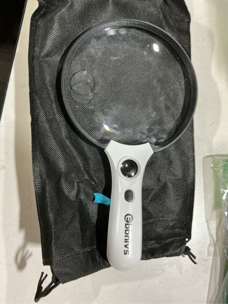 Condition photo showing Good Condition for Large Magnifying Glass with Light, Magnifier Handheld Illuminated Lighted Magnifier with 3 LED Lights 1 UV Light Storage Bag Clean Cloth for Seniors Reading Inspection Black
