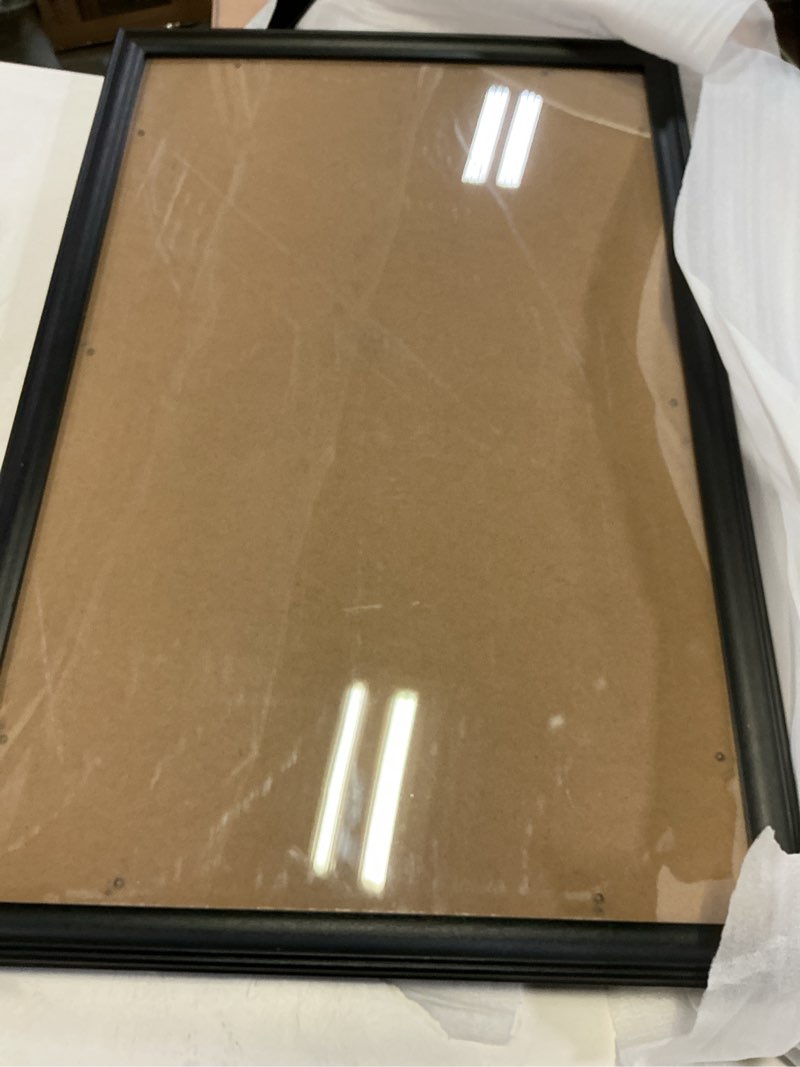 Condition photo showing As Is for 18x27 Aluminum Metal Picture Frame,Tempered Glass Black Large 18 x 27 Poster Frame for Puzzles Photos or Artwork to Wall Mount Horizontal or Vertical for Decorating House,Office,Hotel 18x27 Black