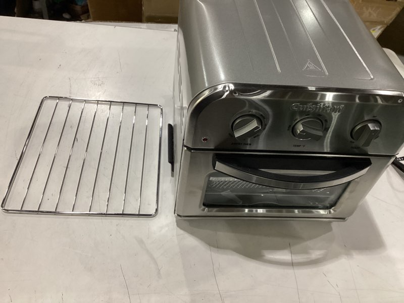 Condition photo showing As Is for **untested** cuisinart compact air fryer toaster oven, stainless steel fryer with 6-in-1 functions, adjustable temperature, includes oven rack, baking pan and air fry basket, toa-26 compact air fryer oven stainless steel