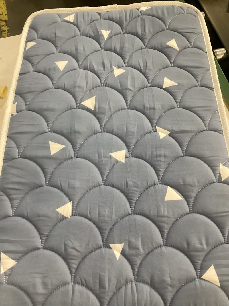 Condition photo showing Good Condition for Mini Crib Mattress 38" x 24" x 4"- Firm Support and Comfort Premium Foam,Noiseless and Odorless,Hypoallergenic Mini Crib Mattress,Fits Mini and Portable Cribs,Dual Sided with Soft Breathable Fabric Starry Sky Blue 38x24x4