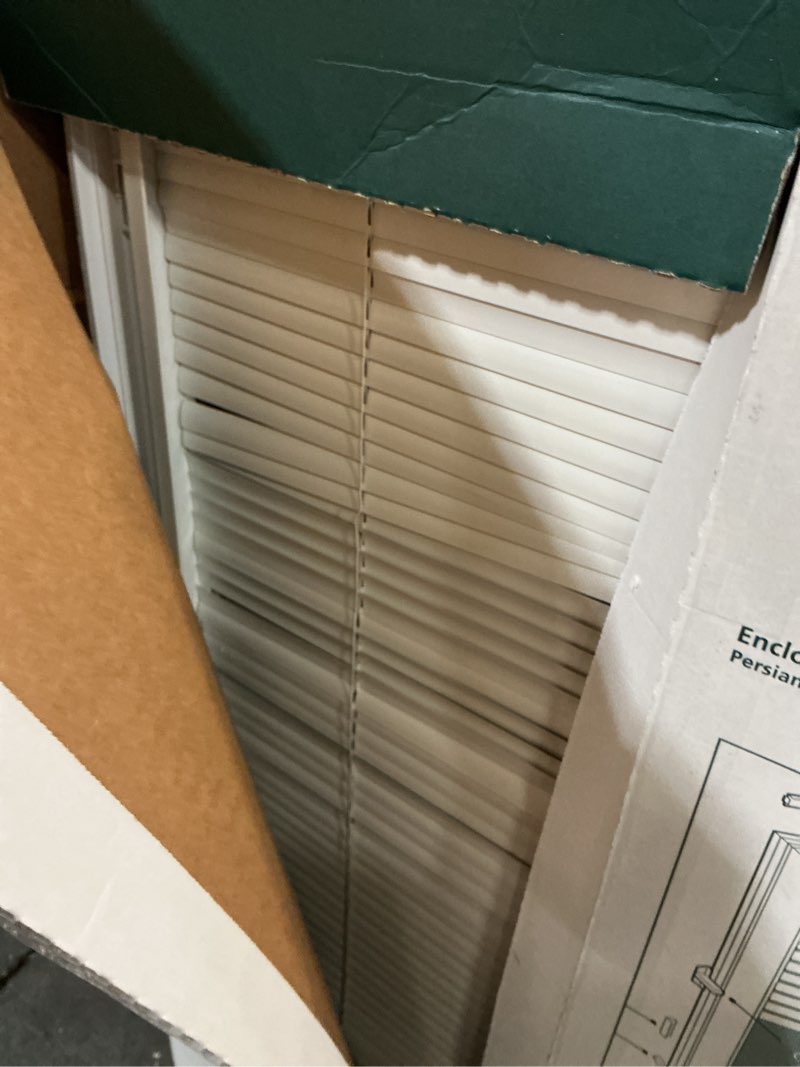 Condition photo showing Good Condition for 22 in. x 36 in. add-on enclosed aluminum blinds in white for steel and fiberglass doors with raised frame around glass
