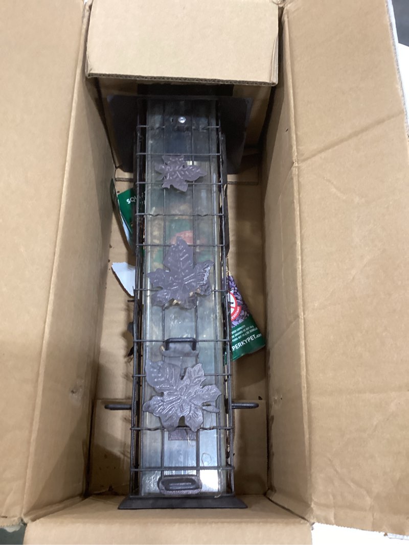 Condition photo showing As Is for perky-pet 336-1sr squirrel-be-gone squirrel proof bird feeder, 2lb, outdoor wild bird feeder with weight-activated perches