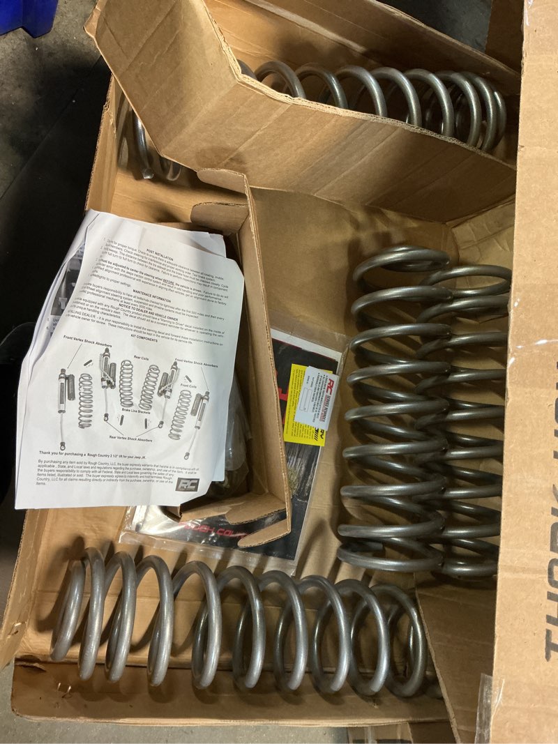 Condition photo showing As Is for Rough Country 2.5 in. Lift Kit, Coils, V2 for Jeep Wrangler JL 4WD 18-23 - 67770