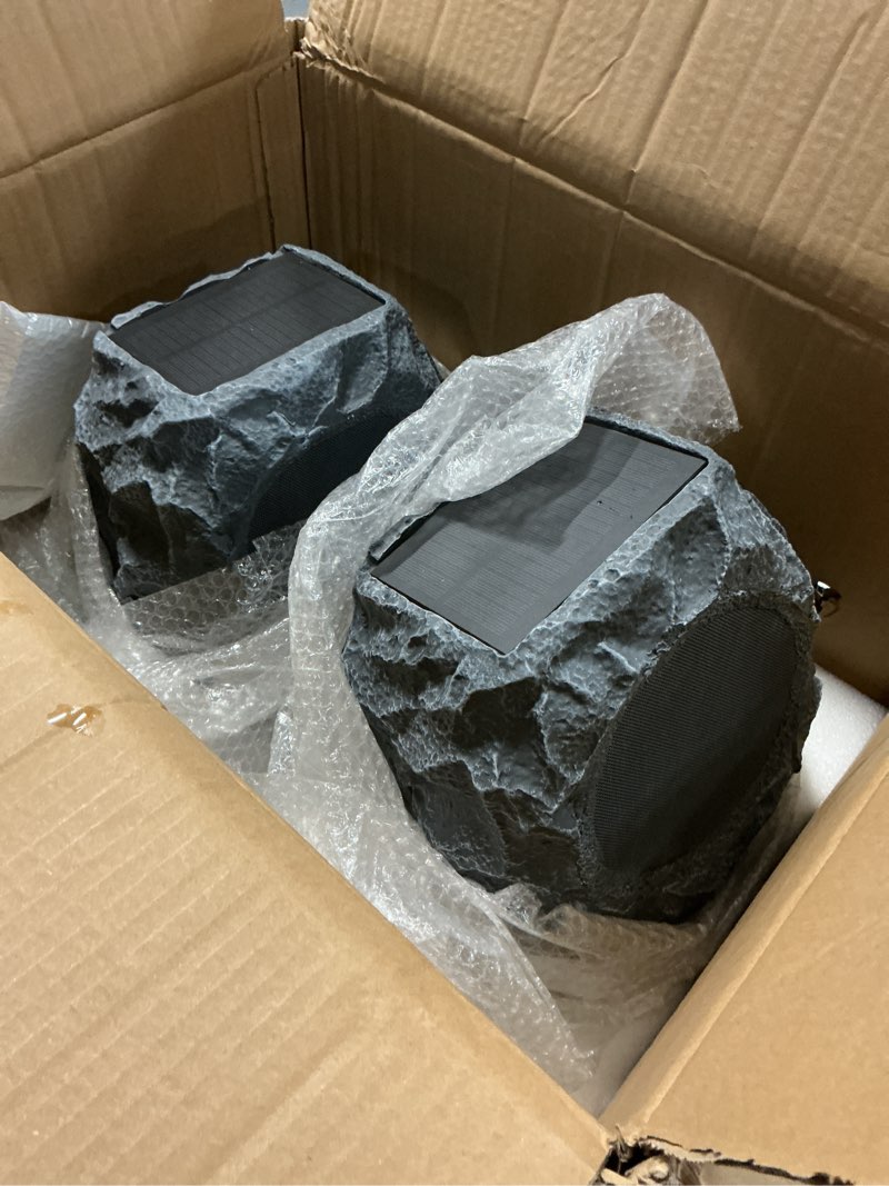 Condition photo showing As Is for upgraded outdoor rock speaker 60w deep bass multi-sync up to 100pcs, remote control, ipx7 waterproof solar-powered bluetooth speaker perfect for pool, garden, patio, ideal for music lovers - 2 packs gray-2pcs