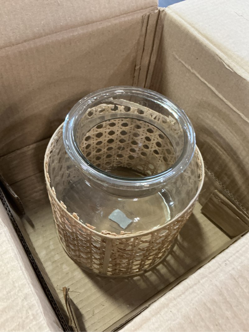 Condition photo showing New/Like New for bloomingville 8"h glass vase with decorative cane sleeve 8” h