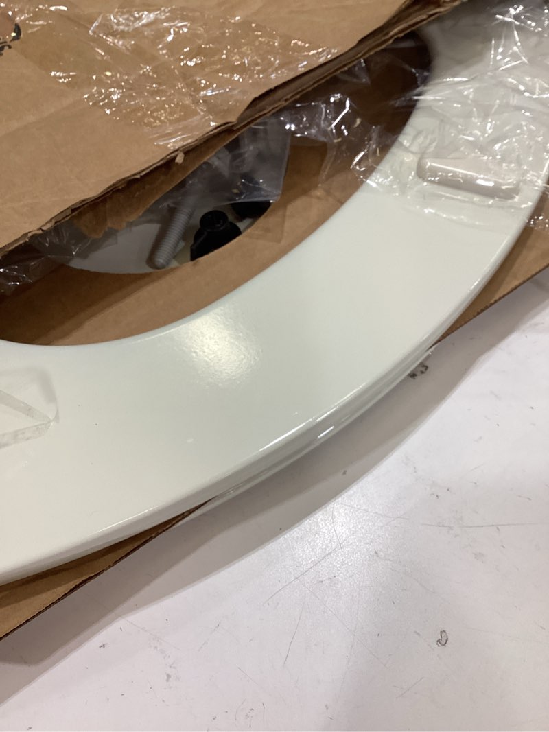 Condition photo showing As Is for church toilet seat, easy clean hinges release for deep cleans, durable enameled wood seat, elongated, biscuit elongated biscuit
