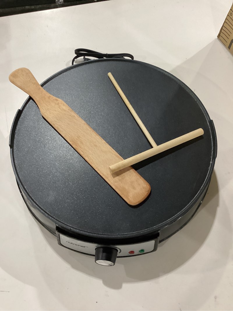 Condition photo showing New/Like New for Nutrichef Electric Crepe Maker & Griddle Cooktop - Nonstick 12 Inch Aluminum Hot Plate with LED Indicator Lights & Adjustable Temperature Control - Wooden Spatula & Batter Spreader Included