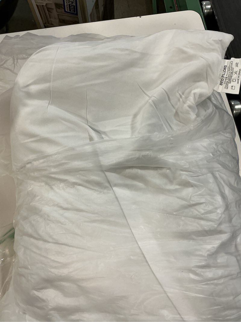 Condition photo showing Good Condition for amazon basics down alternative bed pillows and pillow protector case 2-piece set, medium density, standard - pack of 2, white, 26"l x 20"w standard (2 pillows + 2 protectors) medium pillows + protectors