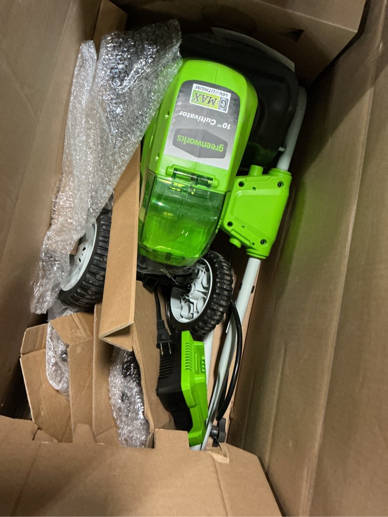Condition photo showing Good Condition for greenworks 40v 10" cordless tiller / cultivator, 4.0ah battery and charger included, green 4ah battery and charger soil tiller cultivator