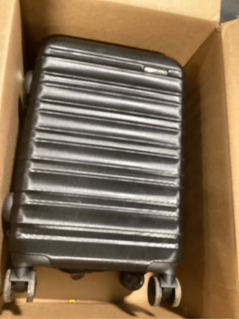 Condition photo showing Good Condition for Amazon Basics 21" Hardside Carry-On Luggage, Hardshell Suitcase With Wheels, Expandable For Up to 25% More Space, With Scratch-Resistant Surface, Four Multi-directional Wheels, Black Black Carry-On