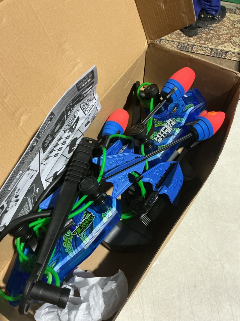 Condition photo showing As Is for Zing HyperStrike Dominator Bow Pack - 1 Blue Dominator Bow, 4 Blue Zonic Whistle Arrows, 1 Set of Bungee Replacement and 1 Shoulder Strap - Great for Long Range Outdoor Play, for Ages 14 and Up