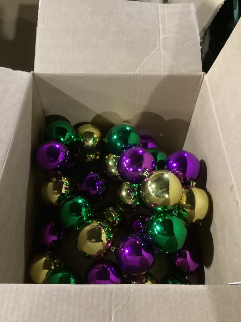 Condition photo showing Good Condition for 9.84ft Jumbo Mardi Gras Beads Garland Decoration Metal Gold Green Purple Hanging Banner for Outdoor Indoor Carnival Parade Party Front Door Fence Wagon Garden Decorations(Classic Style)