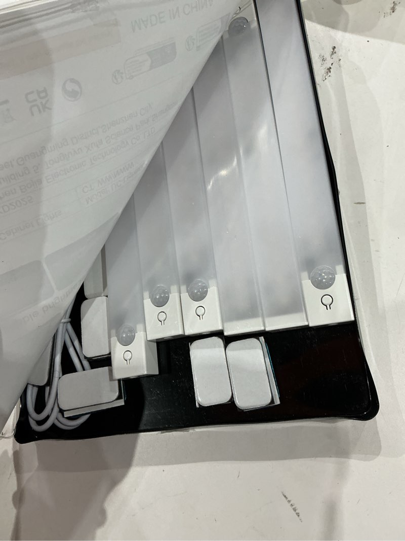 Condition photo showing Good Condition for 6-pack 8-inch under cabinet lighting with charging station rechargeable motion sensor light indoor 3 color dimmable closet light usb led magnetic wireless under counter lights for kitchen stair 8inch 6pack with 1 station