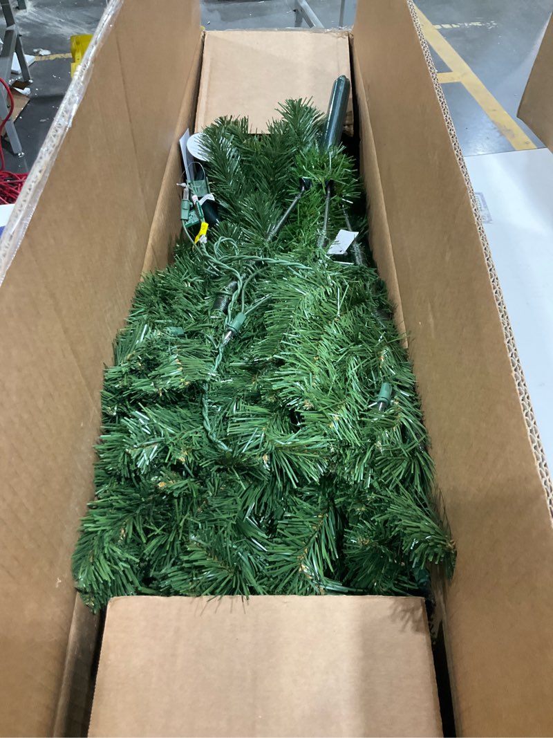 Condition photo showing Good Condition for National Tree Company Pre-Lit Artificial Full Christmas Tree, Green, North Valley Spruce, White Lights, Includes Stand, 4.5 Feet