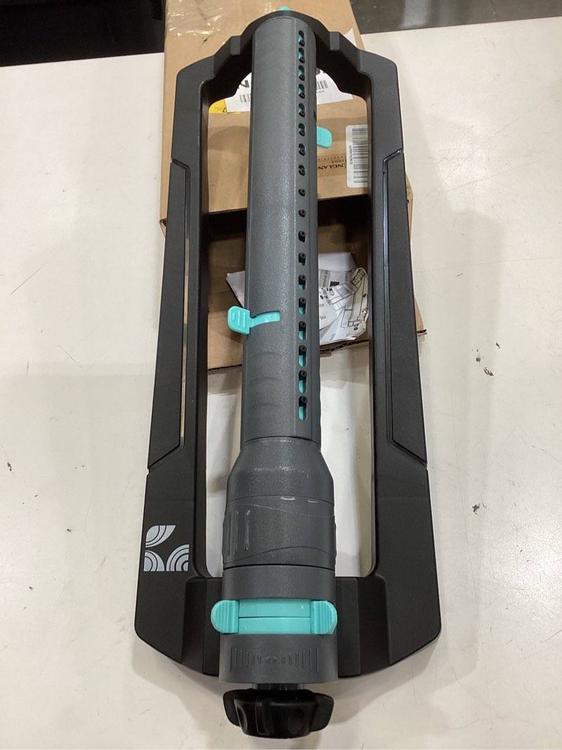 Condition photo showing Good Condition for turbo oscillating sprinkler 100003, adjustable sprinkler spray width & range, covers up to 4,000 square feet, 18 precision nozzles for even watering, by new england garden tools
