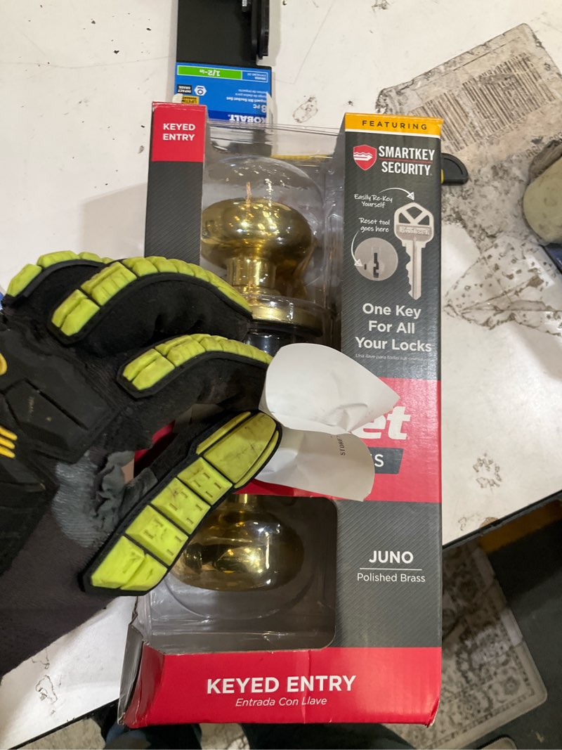 Condition photo showing As Is for kwikset smartkey juno polished brass entry door knob kw1 1-3/4 in.