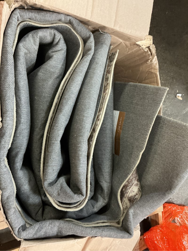 Condition photo showing As Is for Loloi Magnolia Home by Joanna Gaines Sinclair Collection SIN-01 Rust/Lagoon 8'-6" x 11'-6", .25" Pile Height, Machine Washable, Area Rug Rust / Lagoon 8'6" x 11'6" (Rectangular)