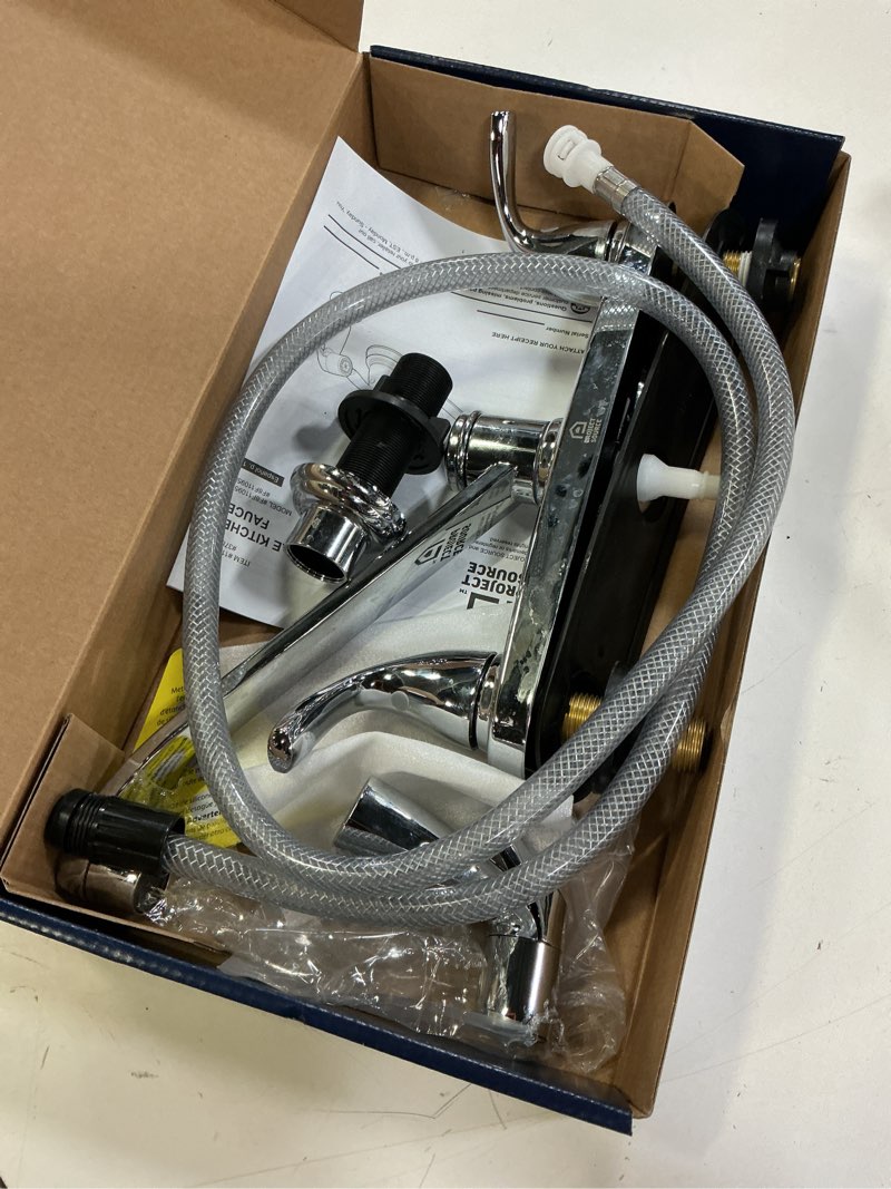 Condition photo showing As Is for project source dover chrome double handle deck-mount kitchen faucet (includes deck plate) (includes side sprayer)