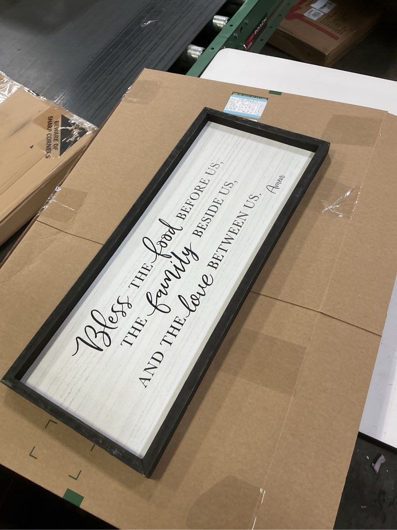 Condition photo showing As Is for TQianJiang Christian Blessing Dining Room Wall Decor 24"×10" Bless The Food Before Us Sign Rustic Farmhouse Kitchen Religious Decor Large Catholic Horizontal Wooden Frame Wall Art Hanging (Black) 24"L x 10"W Christian Blessing Dining Room (Black)