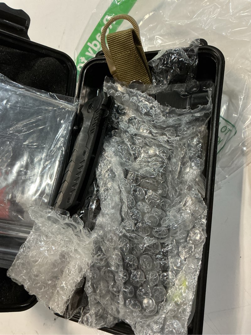 Condition photo showing New/Like New for xuanlan emergency survival kit, outdoor survival gear tool with survival bracelet, fire starter, whistle, wood cutter, water bottle clip, pen (29 in 1)
