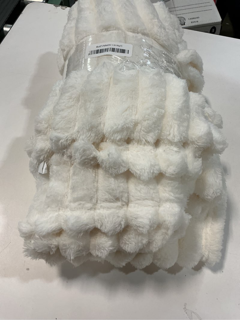 Condition photo showing Good Condition for Bedsure GentleSoft White Throw Blanket for Couch - Cozy Soft Blankets for Women, Cute Small Fleece Throws for Girls, House Bedroom Decor Aesthetic Gift for Women, Off White, 50x70 Inches Off White Throw XL (50" x 70")