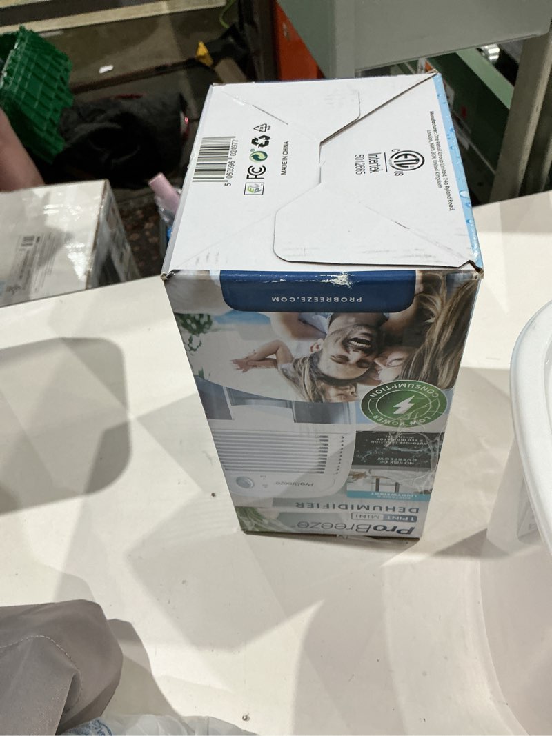 Condition photo showing As Is for pro breeze mini portable dehumidifier, 17oz ultra quiet compact peltier dehumidifier, 215 sqft 1pack