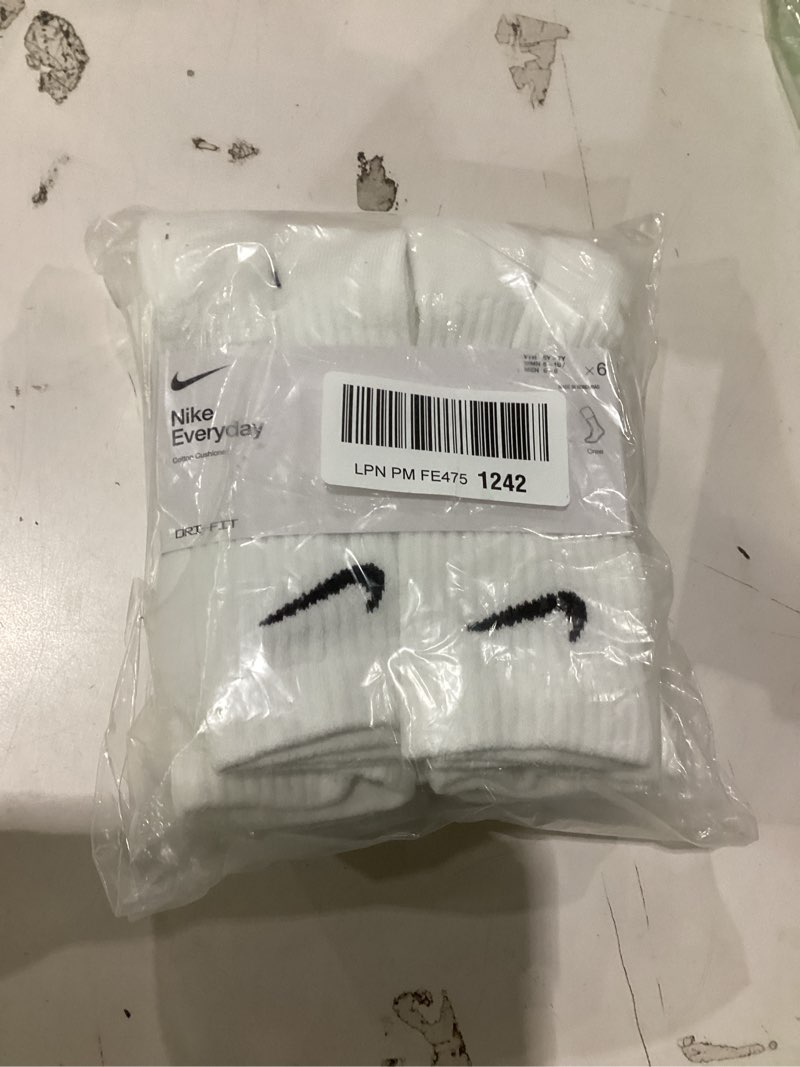 Condition photo showing New/Like New for NIKE Medium White/Black