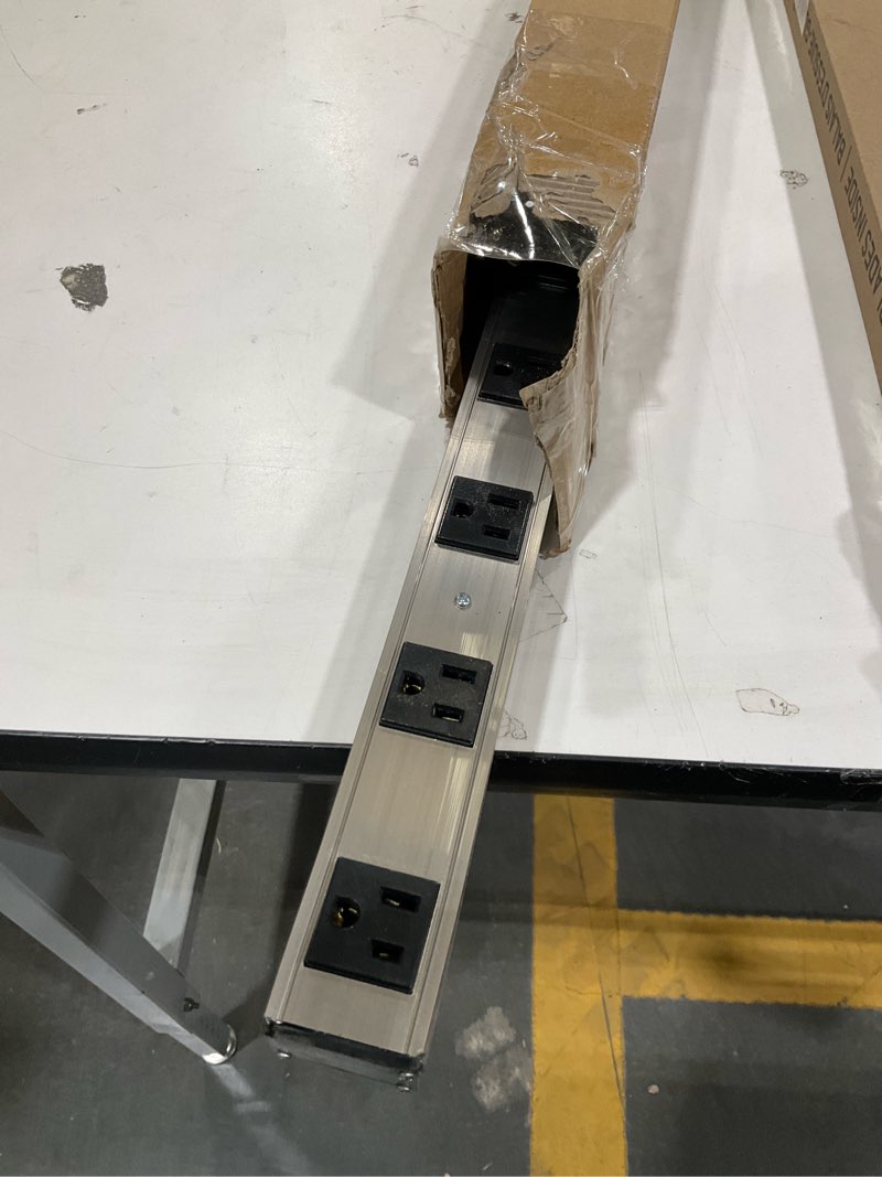 Condition photo showing As Is for Inland 8 Outlet Long Aluminum Heavy Duty Power Strip with 3FT 14AWG Cord, 15A/1875W, Wide Spaced Outlets, ETL Listed Electrical Outlet Extender, Outlet Splitter, Ideal for Office, Garage, Workshop 8 outlet Silver