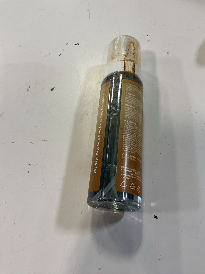 Condition photo showing As Is for l-uv lit foam! light sun kissed tan. transparent and no color transfer foam with vitamin c and e. perfect for a natural and flawless looking tan.