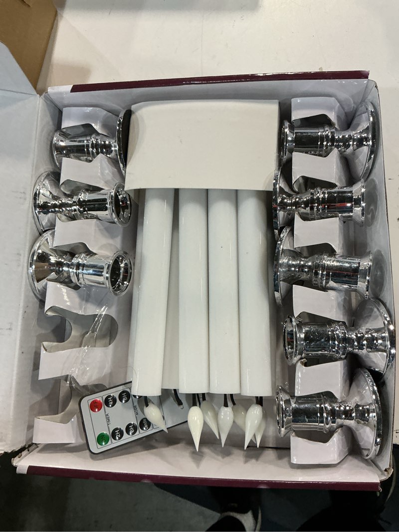 Condition photo showing Good Condition for LED Flameless Window Candles with Remote Timer 10 PCS Battery Operated Flickering Taper Candle Lights with Removable Sliver Candle Holders Best Gift for Xmas Wedding Home Dinner Décor Sliver Base 10 Candles Set