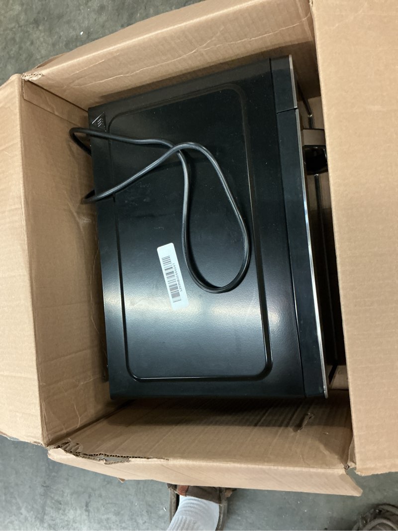 Condition photo showing As Is for Farberware 0.7 Cu. Ft. Countertop Microwave Oven – 700 Watts Power, Auto Cook Settings, Defrost, Easy Clean and Child Safety Lock - Stainless 0.7 Cu. Ft. Stainless Steel