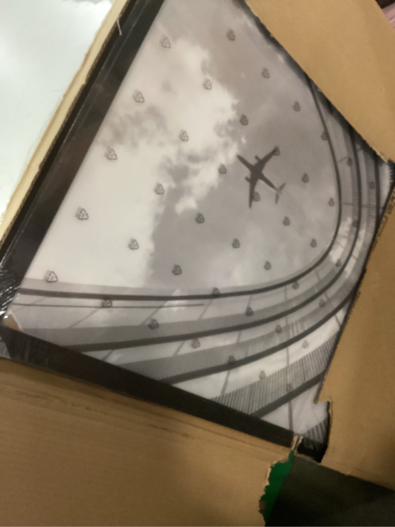 Condition photo showing As Is for KTKDE A1 Black Modern Picture or Poster Frame,23.4x33 Poster Frame Black Woodgrain, Vertical & Horizontal Wall Hanging Large Picture Frame for Photos, Posters & Art Prints Black A1-1Pack