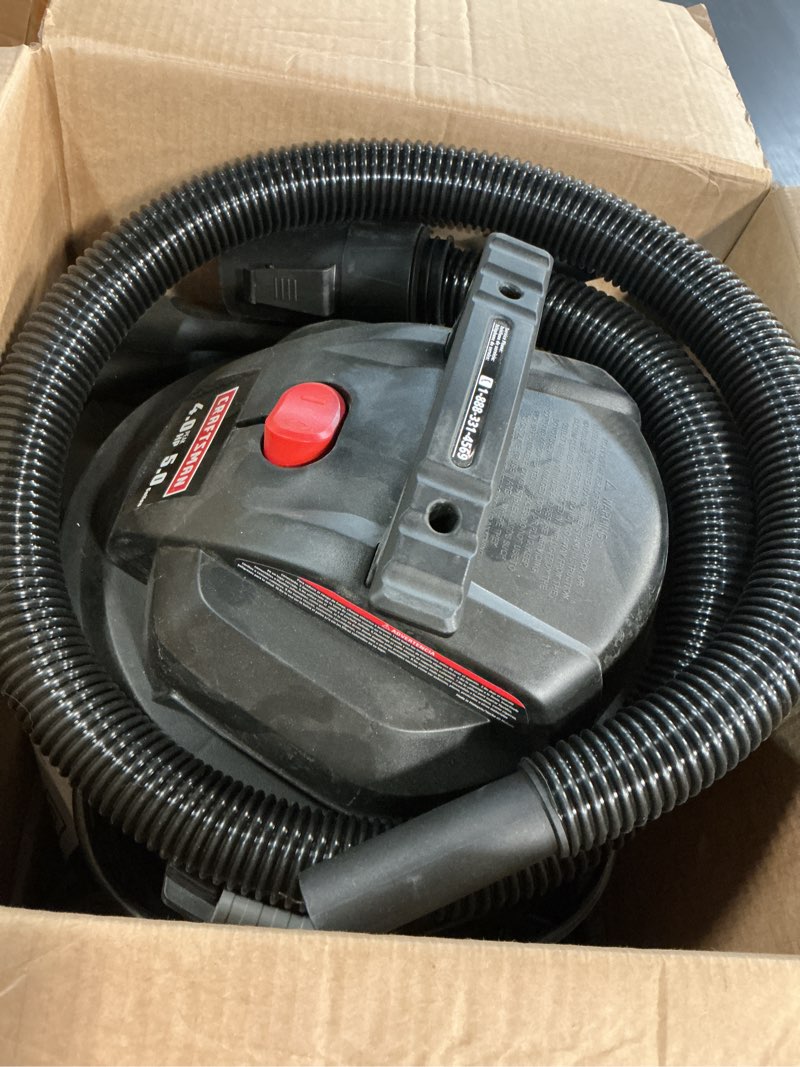 Condition photo showing As Is for craftsman 5-gallon 4-hp corded wet/dry shop vacuum with accessories included