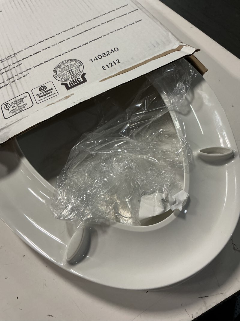 Condition photo showing As Is for kohler 4636-rl-0 cachet readylatch elongated slow close toilet seat, soft close toilet seat quiet lid, contoured grip-tight bumpers installation hardware, apartment essentials, white white elongated ready latch