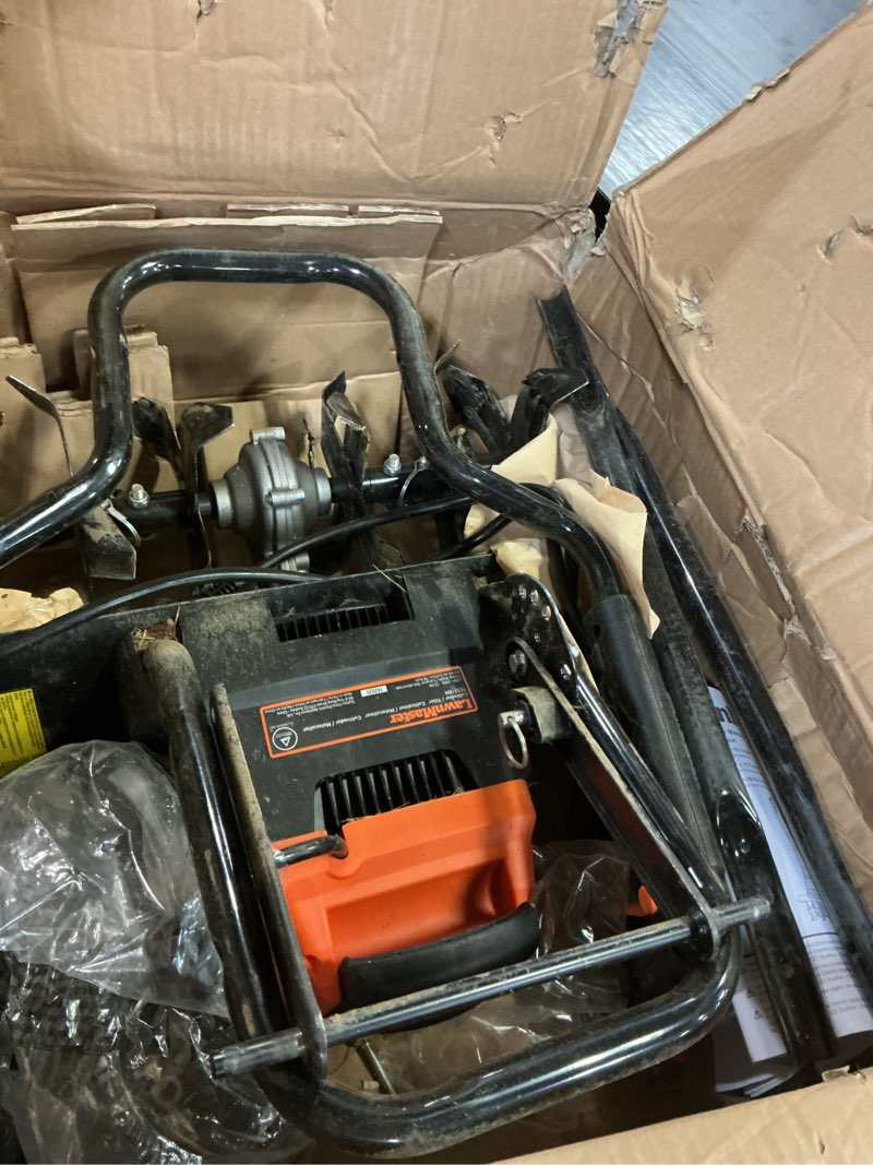 Condition photo showing As Is for lawnmaster te1318w1 corded electric tiller 13.5-amp 18-inch orange