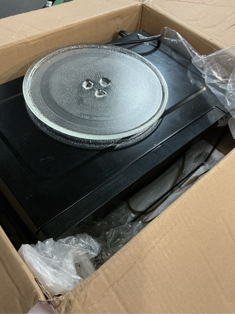 Condition photo showing Good Condition for FRIGIDAIRE EMW733BLACKAMZ 0.7 Cu. Ft. Microwave, Black