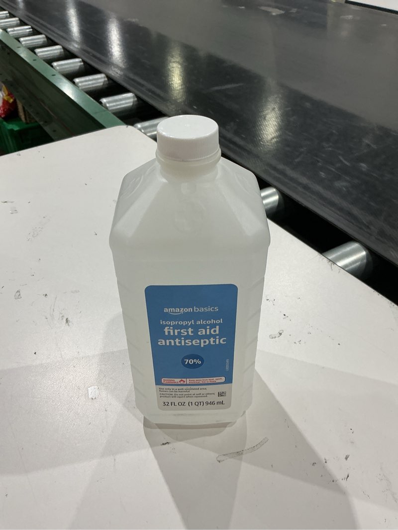 Condition photo showing New/Like New for amazon basics 70% isopropyl alcohol first aid antiseptic for treatment of minor cuts, scrapes and bu