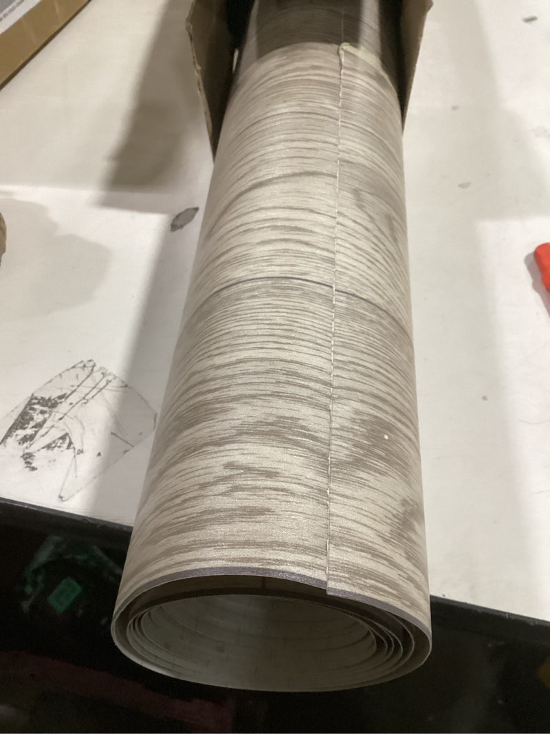 Condition photo showing As Is for Oxdigi Vinyl Flooring Roll Peel and Stick 24"x 118"/19 Sq.Ft, Self Adhesive Wood Planks Floor Sticker, Wear-Resistant Waterproof and Easy DIY Floor Covering for Kitchen, Bathroom, Light Brown Wood 24"Wx 118"L Light Brown Wood