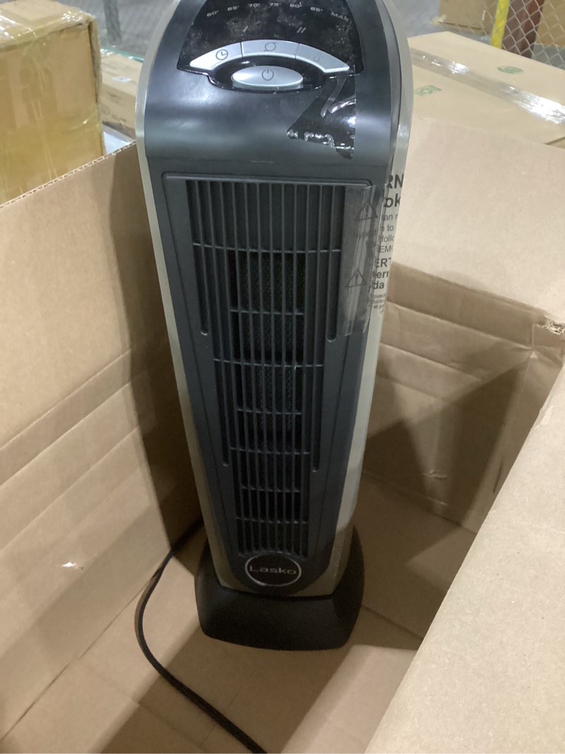 Condition photo showing As Is for Lasko 1500W Ceramic Tower Space Heater with Remote, Thermostat, Timer & Widespread Oscillation, Portable Electric Heater for Indoor Use, Bedroom & Living Room, 751320