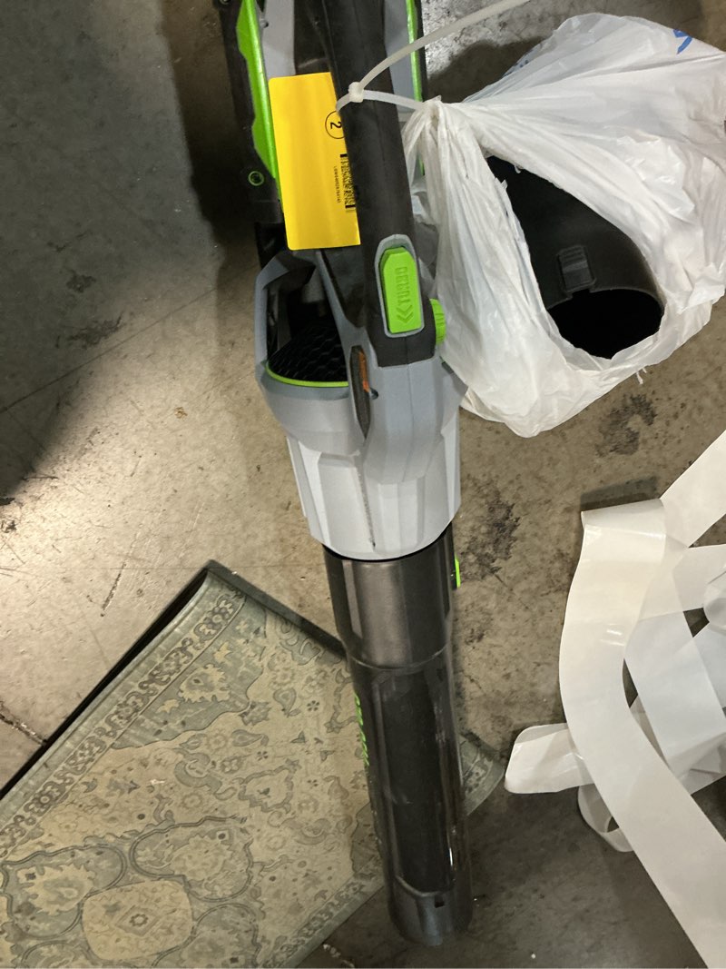 Condition photo showing As Is for ego power+ 56-volt 670-cfm 180-mph battery handheld leaf blower 4.0 ah battery included charger include