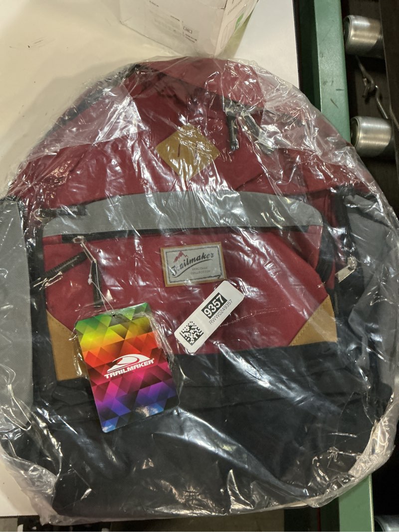 Condition photo showing New/Like New for trailmaker heritage collection backpack with 16" x 10" laptop holder red/gray