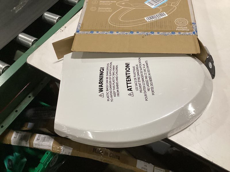 Condition photo showing New/Like New for jool baby quick flip toilet seat with built-in potty & splash guard for toddler training, slow close (elongated) oblong
