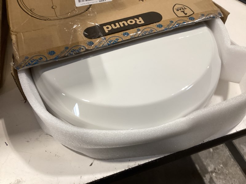 Condition photo showing Good Condition for quick flip toilet seat with built-in potty & splash guard for toddler training, slow close - jool baby (round)