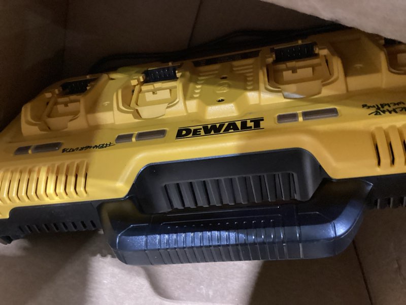 Condition photo showing New/Like New for dewalt battery charger for 12v max, 20v max and flexvolt 20v/60v max batteries, 8 amp, 4 port simultaneous fast charging station (dcb104)
