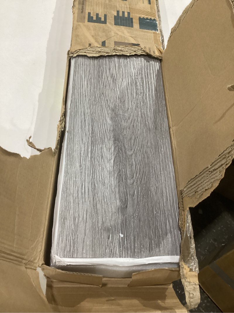 Condition photo showing Good Condition for art3d peel and stick floor tile vinyl wood plank 36-pack 54 sq.ft, deep gray, rigid surface hard core easy diy self-adhesive flooring 36 x 6 x 0.1 inches deep grey 36