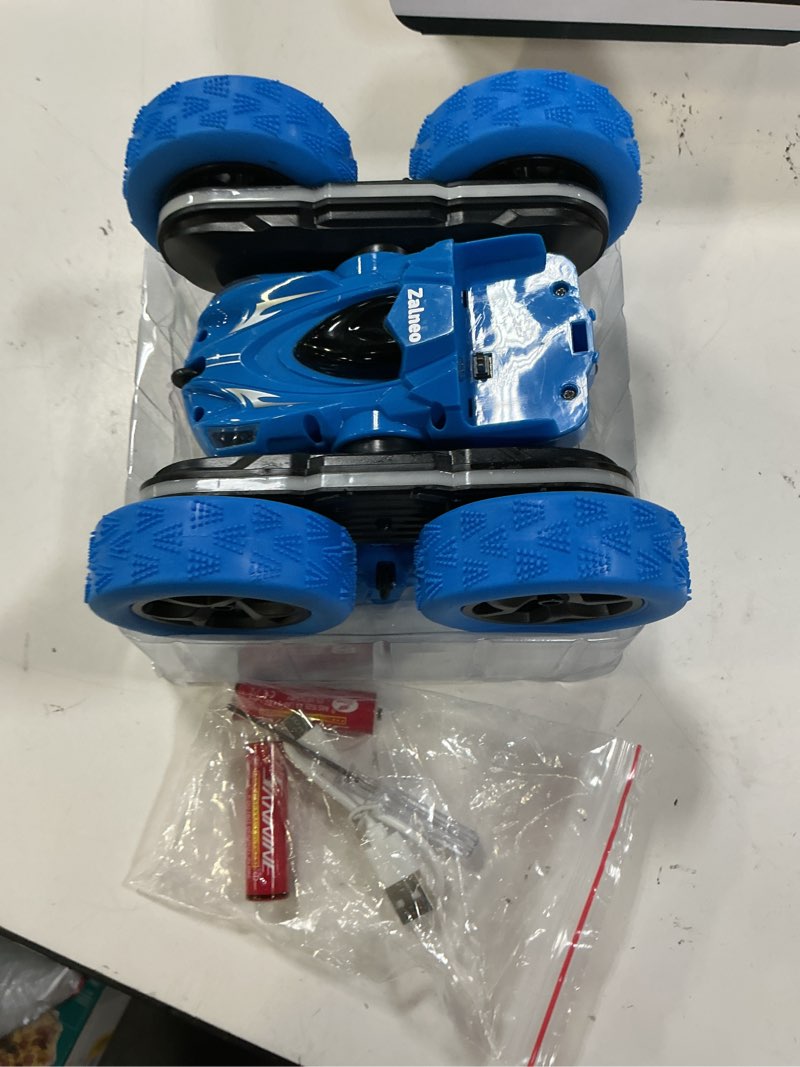 Condition photo showing As Is for remote control stunt car 4wd 360° flip double?sided rc cars, led light bar, usb?c modular battery, 2.4ghz outdoor beach toy for boys 6?12 years old, birthday & christmas kids gift, blue