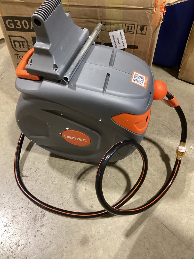 Condition photo showing As Is for new retractable garden hose reel 5/8 inch x 65 ft any length lock 9 pattern nozzle wall-mounted automatic slow return 180° swivel uv resistant heavy duty hose reels for outside